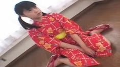 Japanese teen plays with toys and cock